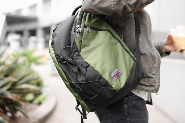 A person carrying a Smart Alec 2.0.